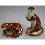 A Royal Crown Derby paperweight, Playful Otter, gold stopper, boxed; another, Otter, gold stopper,