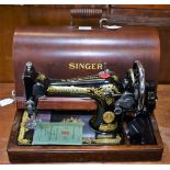 A late 19th century Singer sewing machine, serial no EA817847,