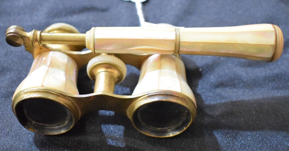 A pair of 19th century French mother of pearl and gilt brass opera glasses,