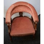 A late 19th early 20th century mahogany tub chair, open arm,