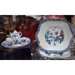 A miniature Staffordshire Willow pattern tea for two on tray,