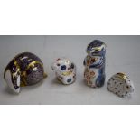 A Royal Crown Derby paperweight, Baby Rabbit, printed marks, gold stopper, boxed; others, similar,