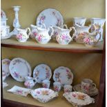 A collection of Royal Crown Derby Posies pattern, including jugs, candlesticks,