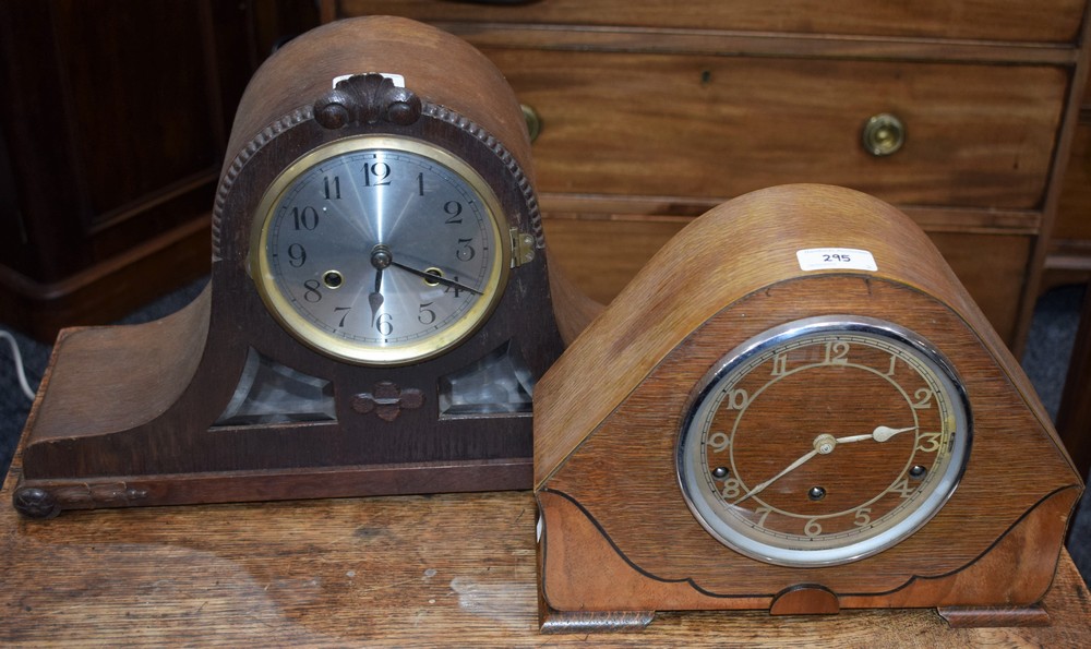 An early 20th century mantel clock, oak cased, silvered dial with Arabic numerals, minute track,