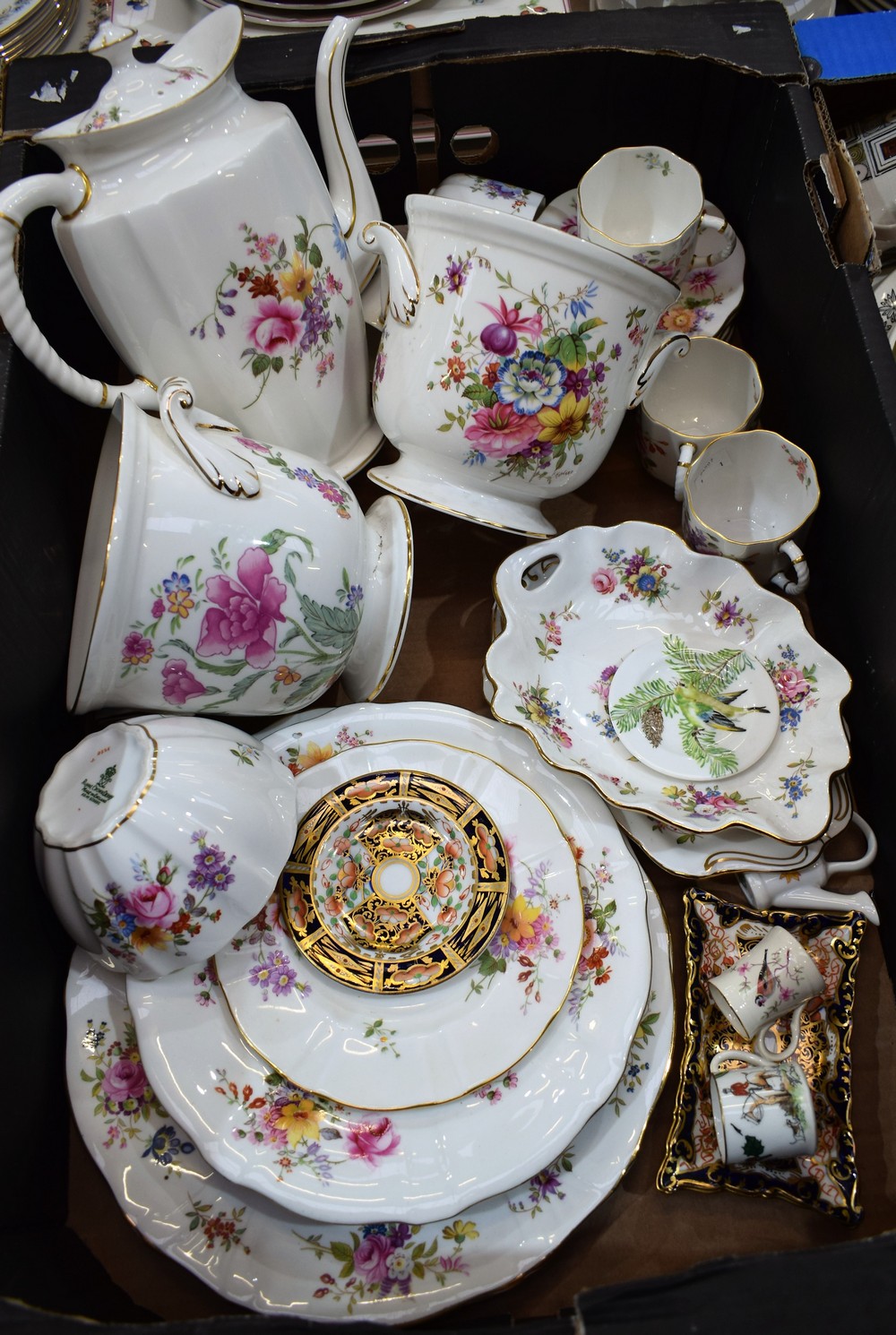 A Royal Crown Derby Posies pattern coffee pot, six coffee cups and saucers,