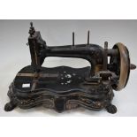 A 19th century Gritzner and Co cast iron sewing machine,