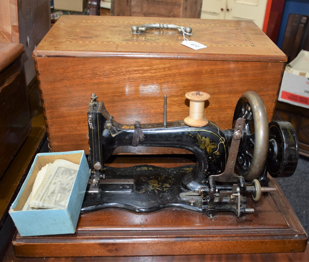 A 19th century Frister & Rossmann hand cranked sewing machine