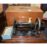 A 19th century Frister & Rossmann hand cranked sewing machine