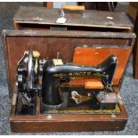 A Singer hand cranked sewing machine, numbered ED883760,