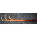 An early 20th century ebonised walking stick,