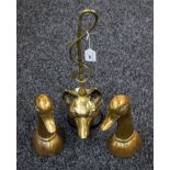 A pair of brass book ends, as duck's heads, 23.