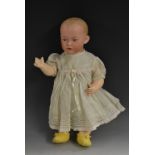 A Heubach bisque head baby doll, Germany, 7, painted intaglio eyes, closed mouth, moulded hair,