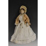 A French papier mache doll, late 19th century, with painted features, brown hair, leather body,