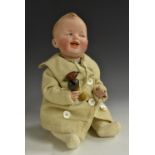 A Gebruder Heubach bisque head baby doll, painted blue intaglio eyes, open mouth, moulded hair,
