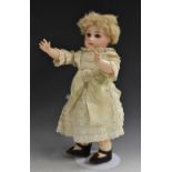 A rare early Portrait Jumeau bisque head Bebe, French circa 1880,