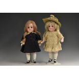 A Kestner all bisque doll`s house doll, with sleeping blue eyes, closed mouth, blond wig,