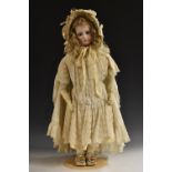 A German bisque head character doll, Lady of Fashion, with open blue eyes, closed mouth,