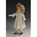 A Kestner bisque head doll, 192, closing brown eyes, painted eyelashes and brows, closed mouth,