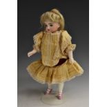 A Kestner all bisque doll`s house doll, with sleeping blue eyes, closed mouth, blond wig,