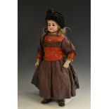 A Simon and Halbig bisque head doll, German 1870, with sleeping brown eyes,