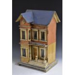 A 19th century German double fronted dolls' house, lithographed paper on wood, two storey,