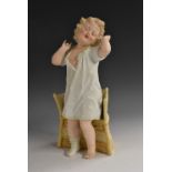 A Gebruder Heubach bisque figure, Bedtime,