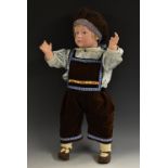 A Gebruder Heubach bisque head pouty character boy doll, with open eyes, closed mouth, blond wig,