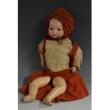 An Armand Marseille baby doll, sleeping brown eyes, closed mouth, composite jointed body,