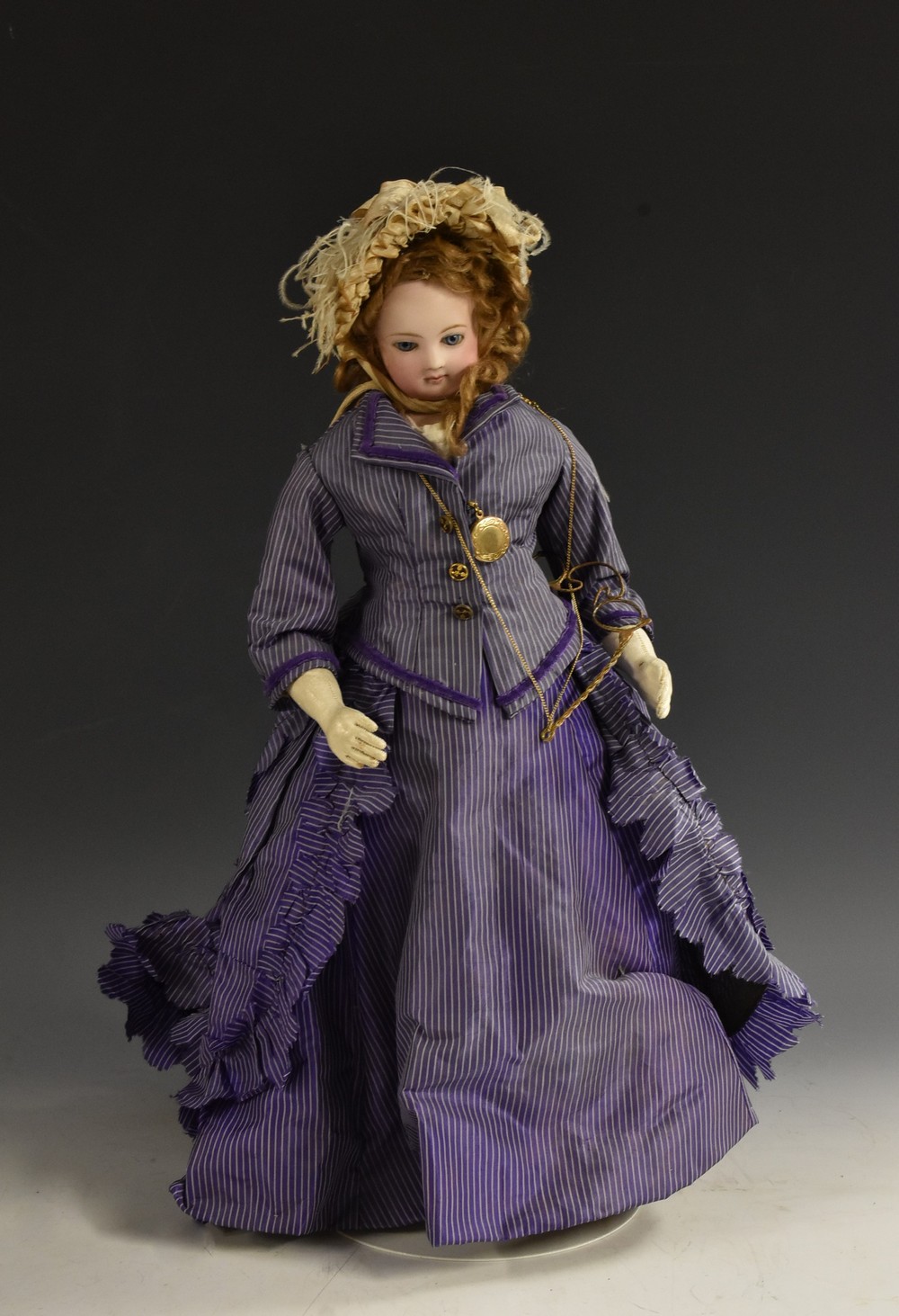 A Jumeau bisque shoulder head fashion doll, French circa 1870,