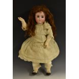 A Kestner bisque head doll, sleeping brown glass eyes, painted eye lashes and brows, closed mouth,