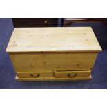 A contemporary pine mule chest, hinged cover,