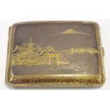 A Japanese Shakudo gilt metal cigarette case c.