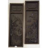 A pair of Chinese wooden wall mounted carvings