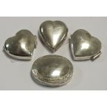 Three sterling silver trinket pots in the form of love hearts;