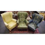 A Parker Knoll wingback armchair and two others.