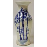A Chinese blue and white baluster shaped vase decorated with sprouting bamboo shoots