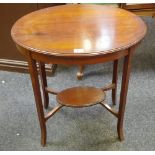 A mahogany occasional table, oval top, shaped stretchers, oval undertier,