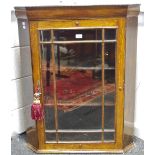 A 19th century oak cased astragal glazed corner cupboard c.