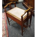 A Sheraton Revival piano stool, lyre shaped supports, tapering legs, c.