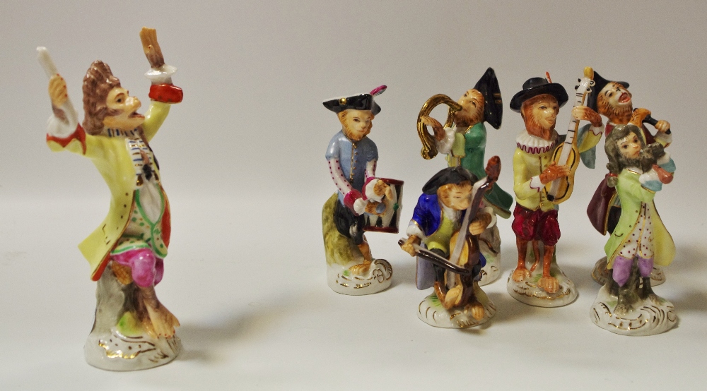 Seven Sitzendorf porcelain monkey band models,