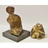 A bronze abstract figure;