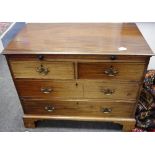 An early 19th century mahogany bachelor's chest, moulded top over brushing slide,