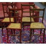 Four bedroom chairs with canework seats.