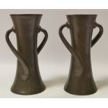 A pair of Tudric Pewter Arts and Crafts waisted vases with writhen handles no 030