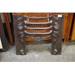 A late Victorian cast iron bedroom fire surround