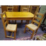 A modern pine kitchen table 78cm high x 167cm long x 89cm wide;