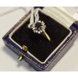 A sapphire and diamond cluster ring,