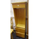 An oak effect tall storage unit,