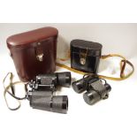 A pair of Zeiss binoculars, cased; a pair of Swift binoculars,
