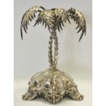 A silver plated centre piece in the form of palm trees on a domed triform base with leaf